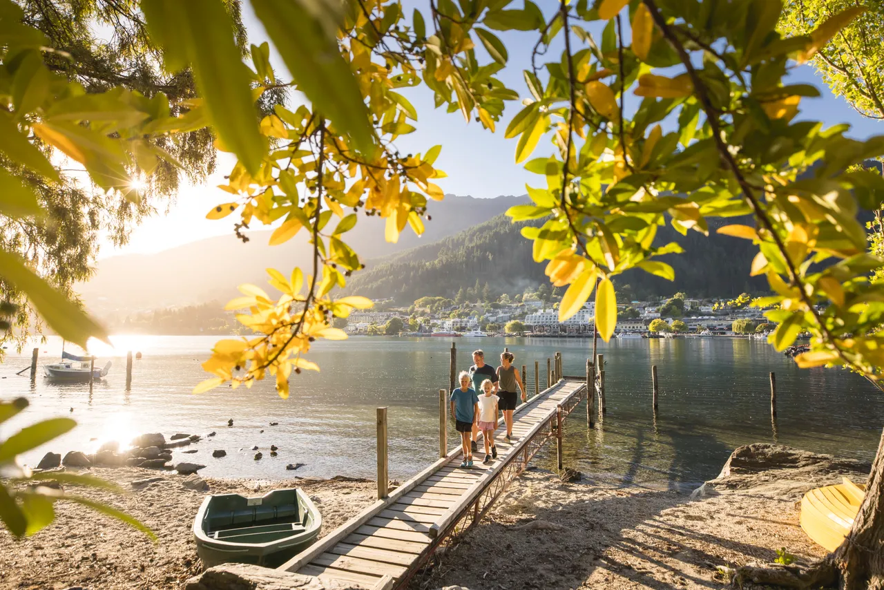 Family walking on pier - Queenstown Gardens