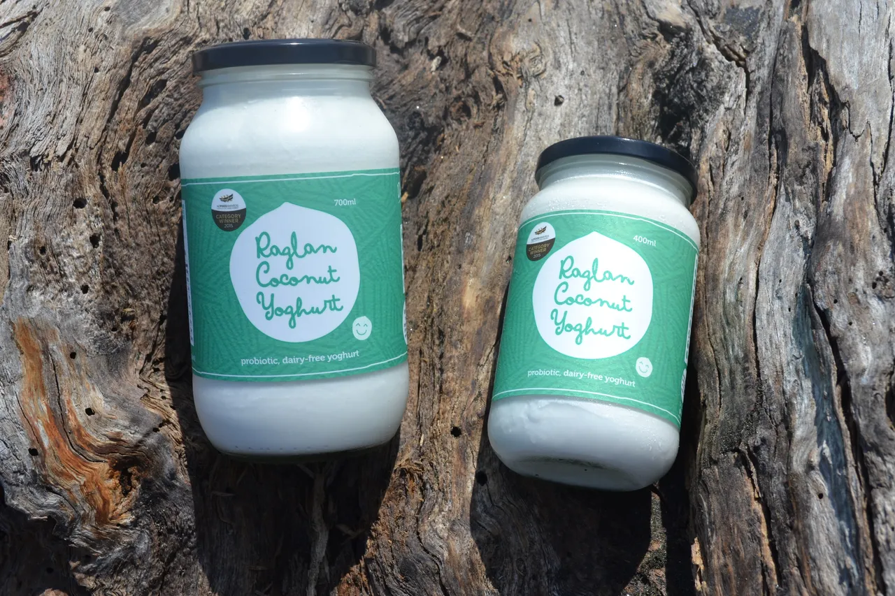 Two jars with driftwood background