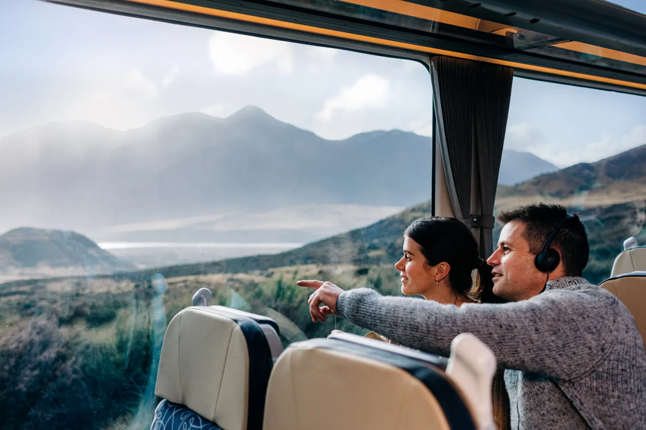 Couple enjoying TranzAlpine journey