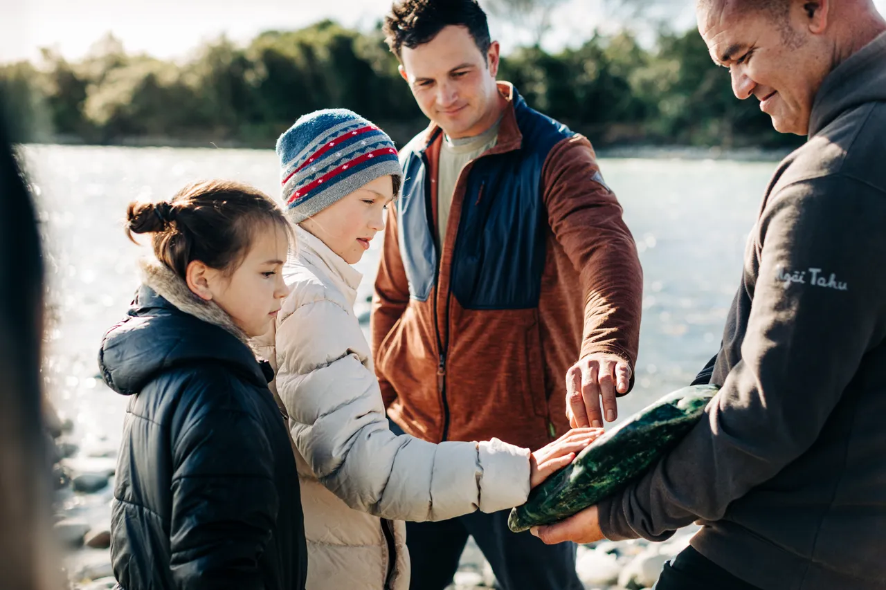 Family appreciating green stone history on the West Coast