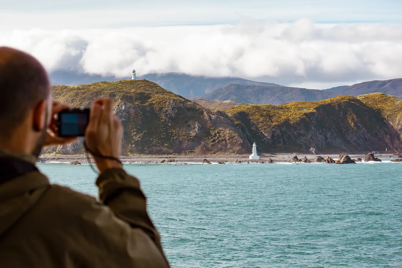 Scenery - Photographer passing Pencarrow