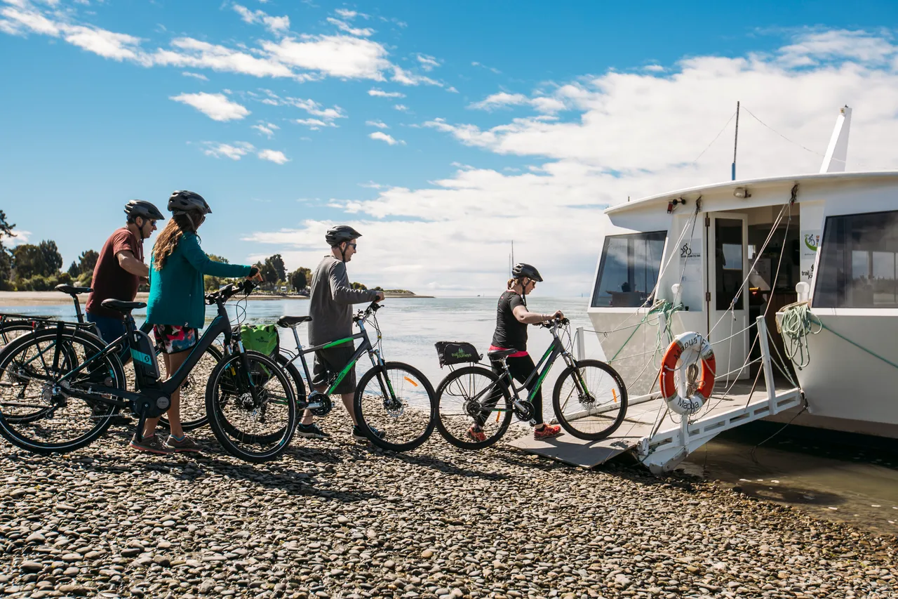 Boarding Mapua Ferry - Group of Friends Cycling Tasmans Great Taste Trail
