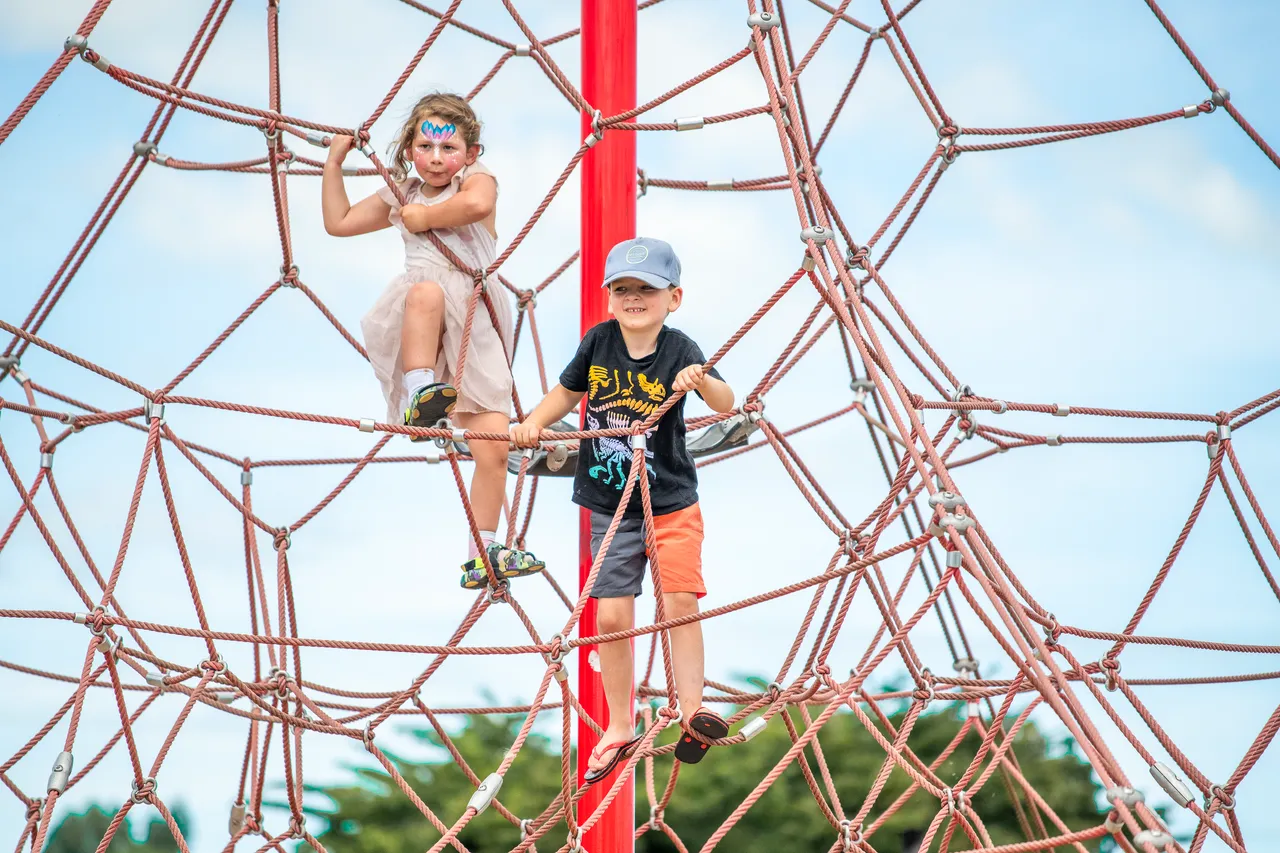 Children climbing in a playground