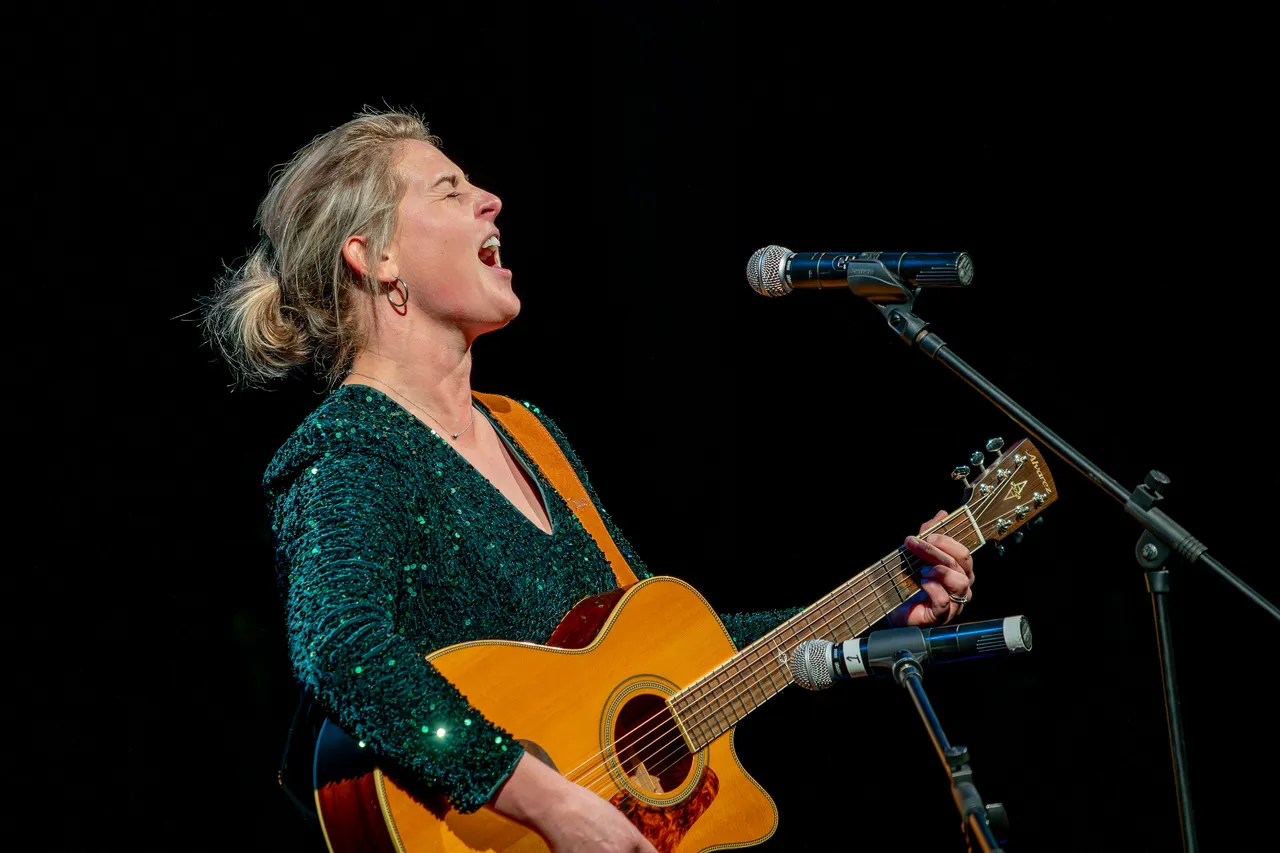 Woman playing guitar