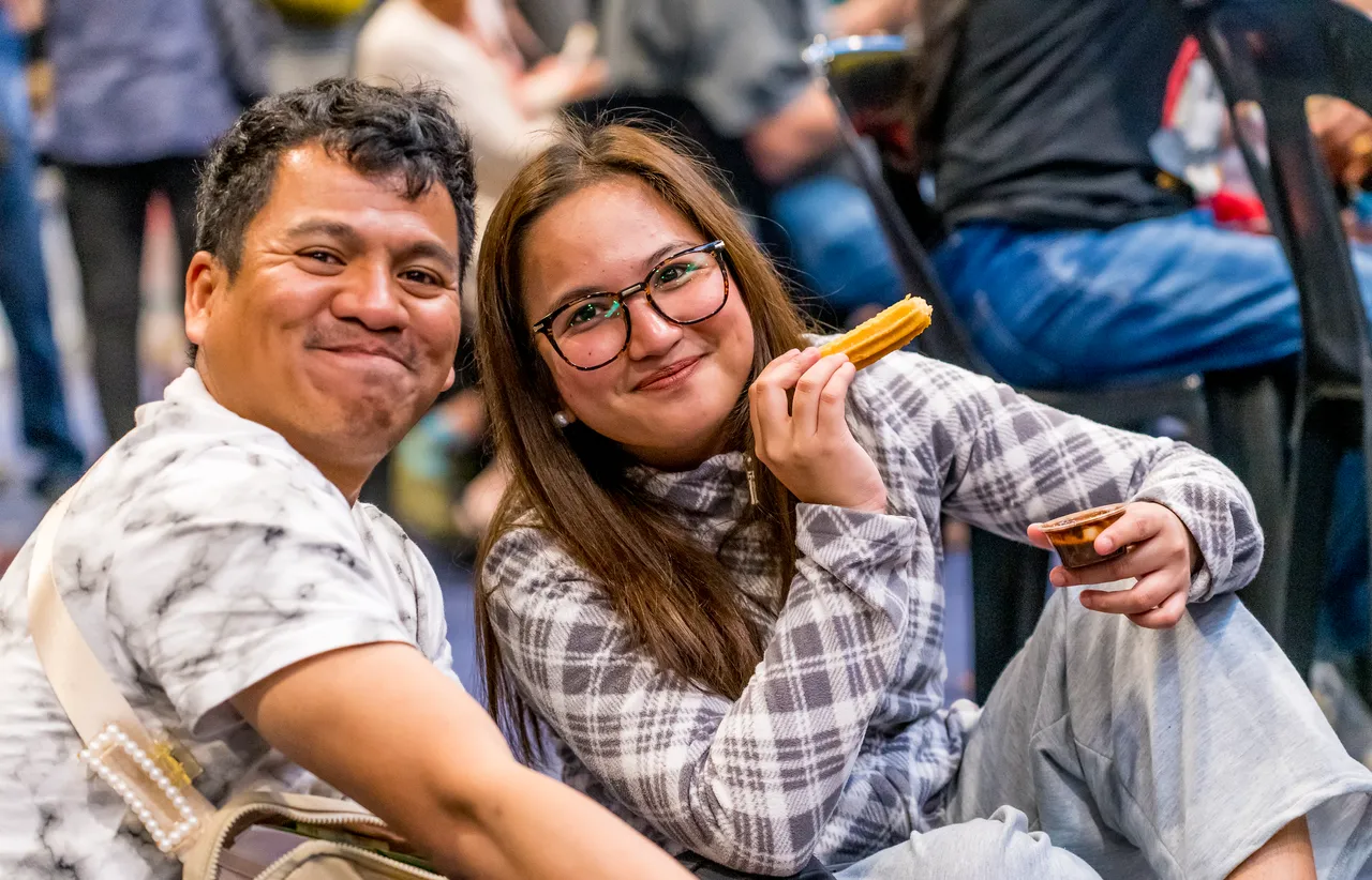 Couple smile at the camera