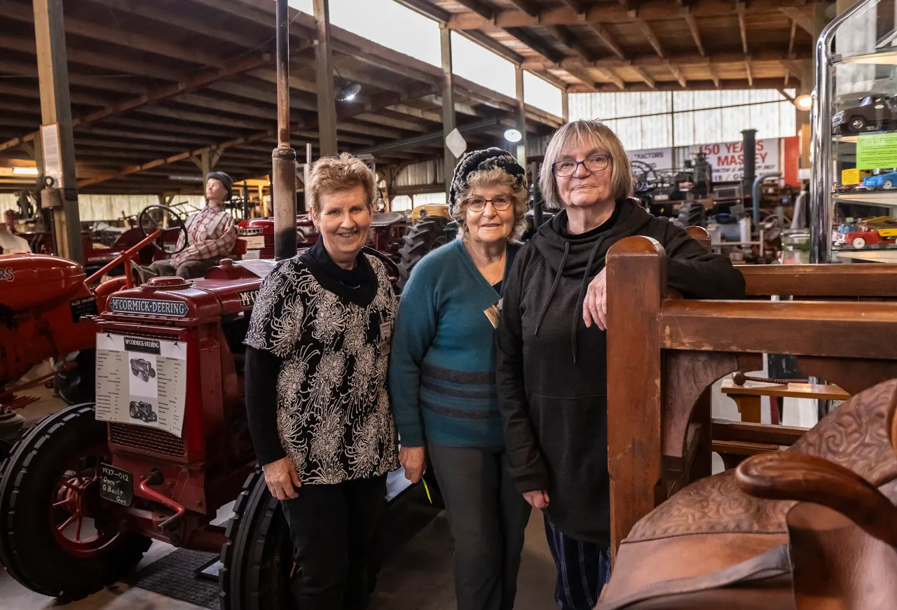 Three woman inside a museum