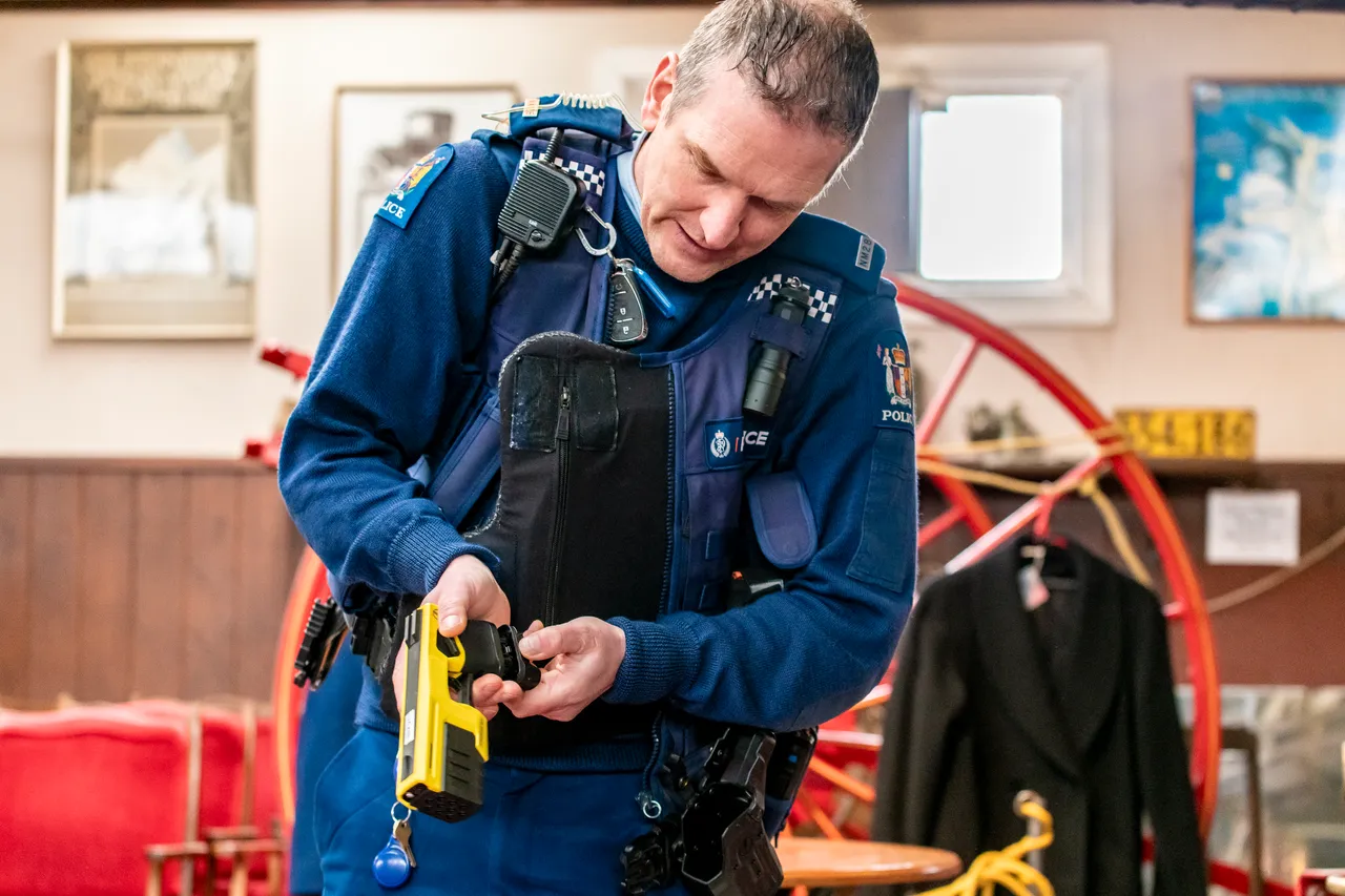 policeman with taser