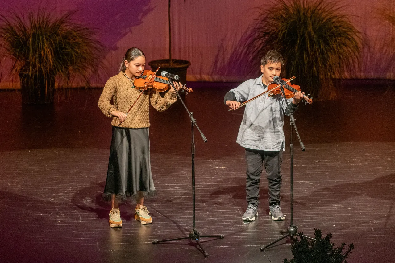 Children performing on stage