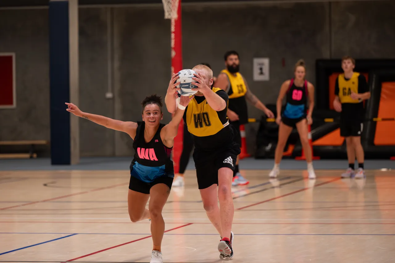 Players catching a netball