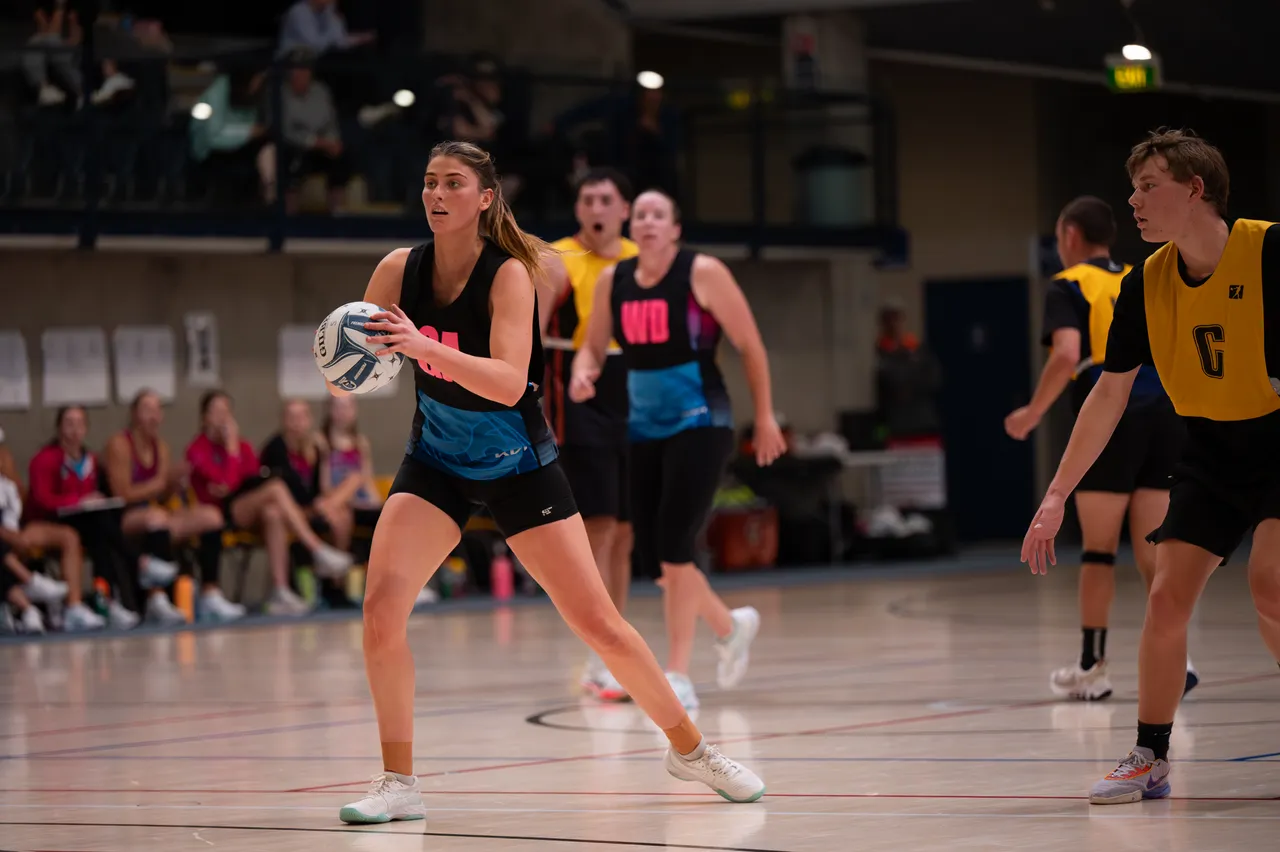 Netball player holding a ball