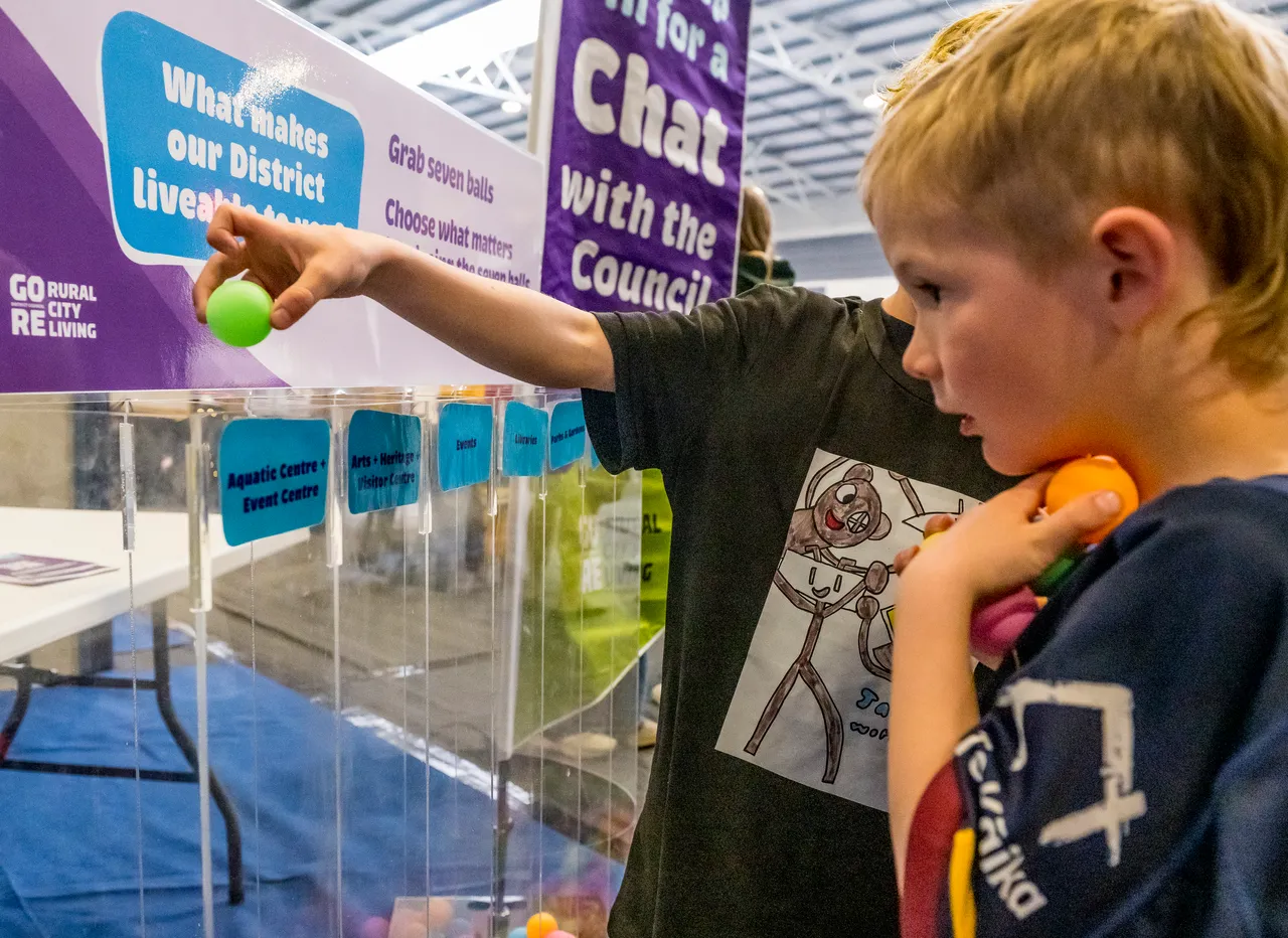 children out balls in council voting tube