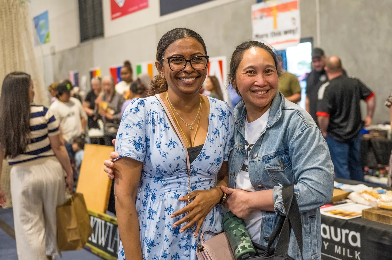 two woman smiling