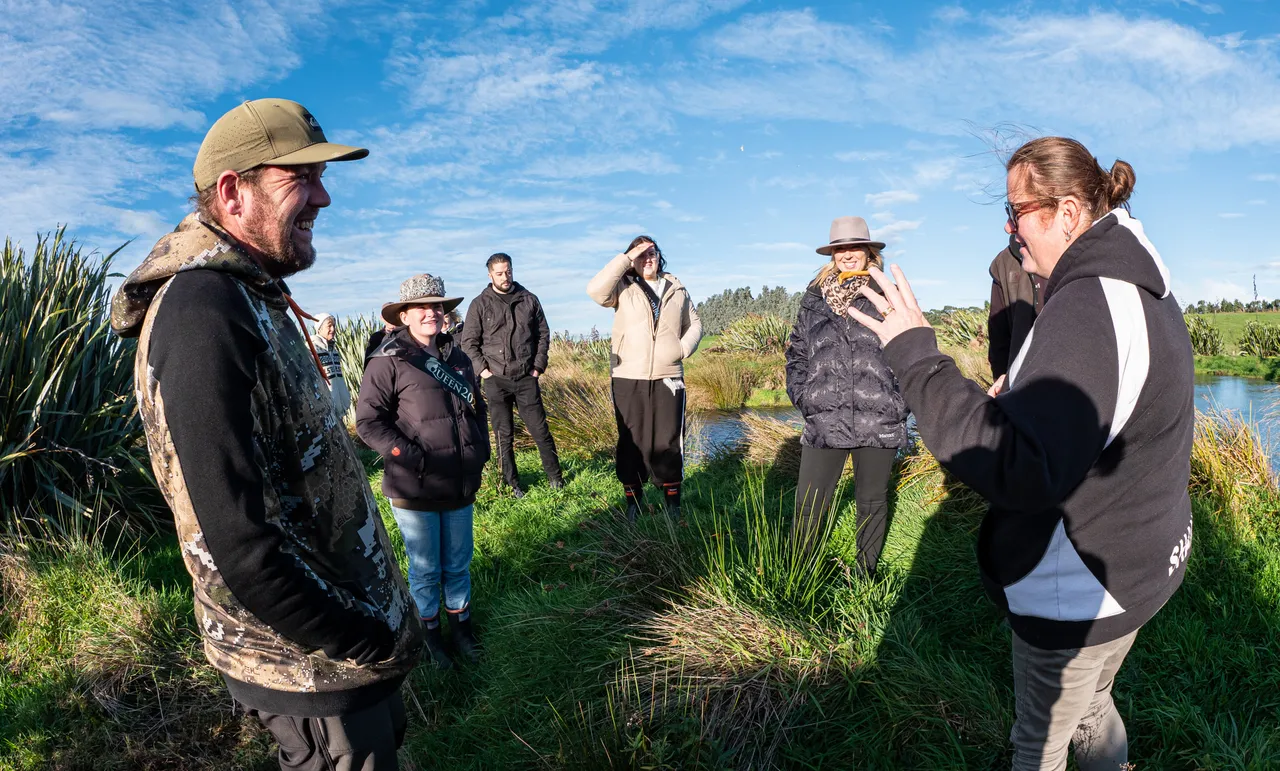 people chatting on a farm