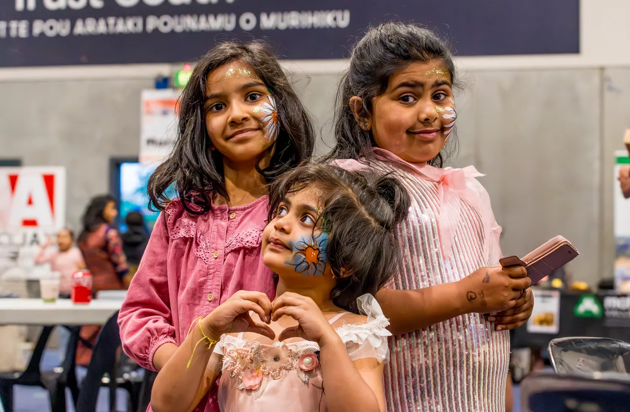 three children with their facepainted
