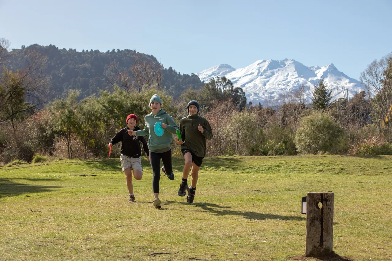 Children playing disc golf
