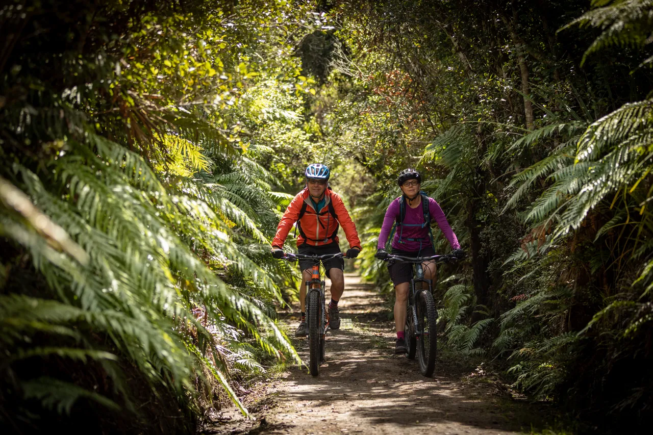 Couple Mountain Biking The Marton Sash and Door Trail