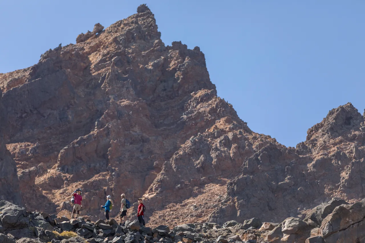 People hiking on Whakapapa Skifield in summer