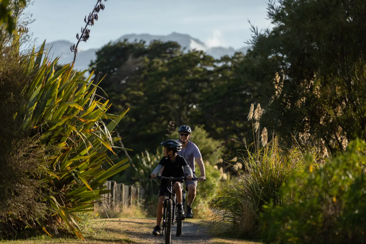A family mountain biking down the Mangawhero walkway