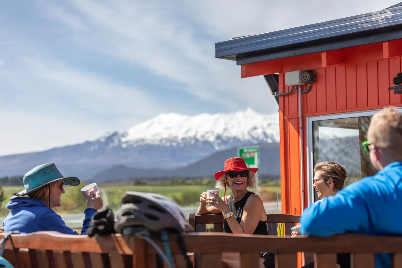 A group of friends enjoying a drink at Schnapps in National Park