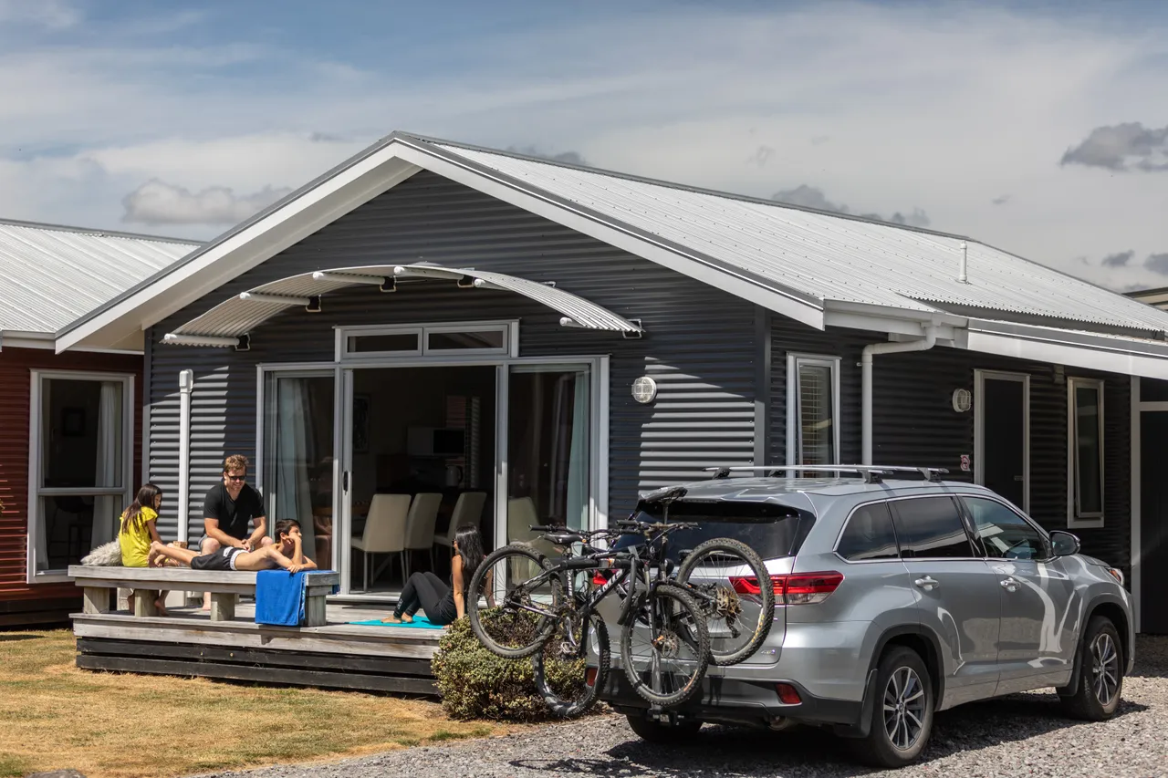 A family enjoying the sun at Rocky Mountain Chalets