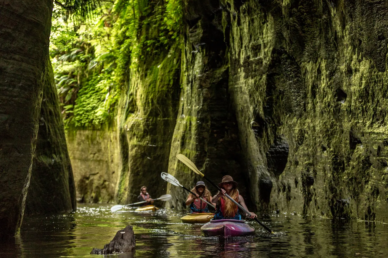 Friends kayaking at Blue Duck Station
