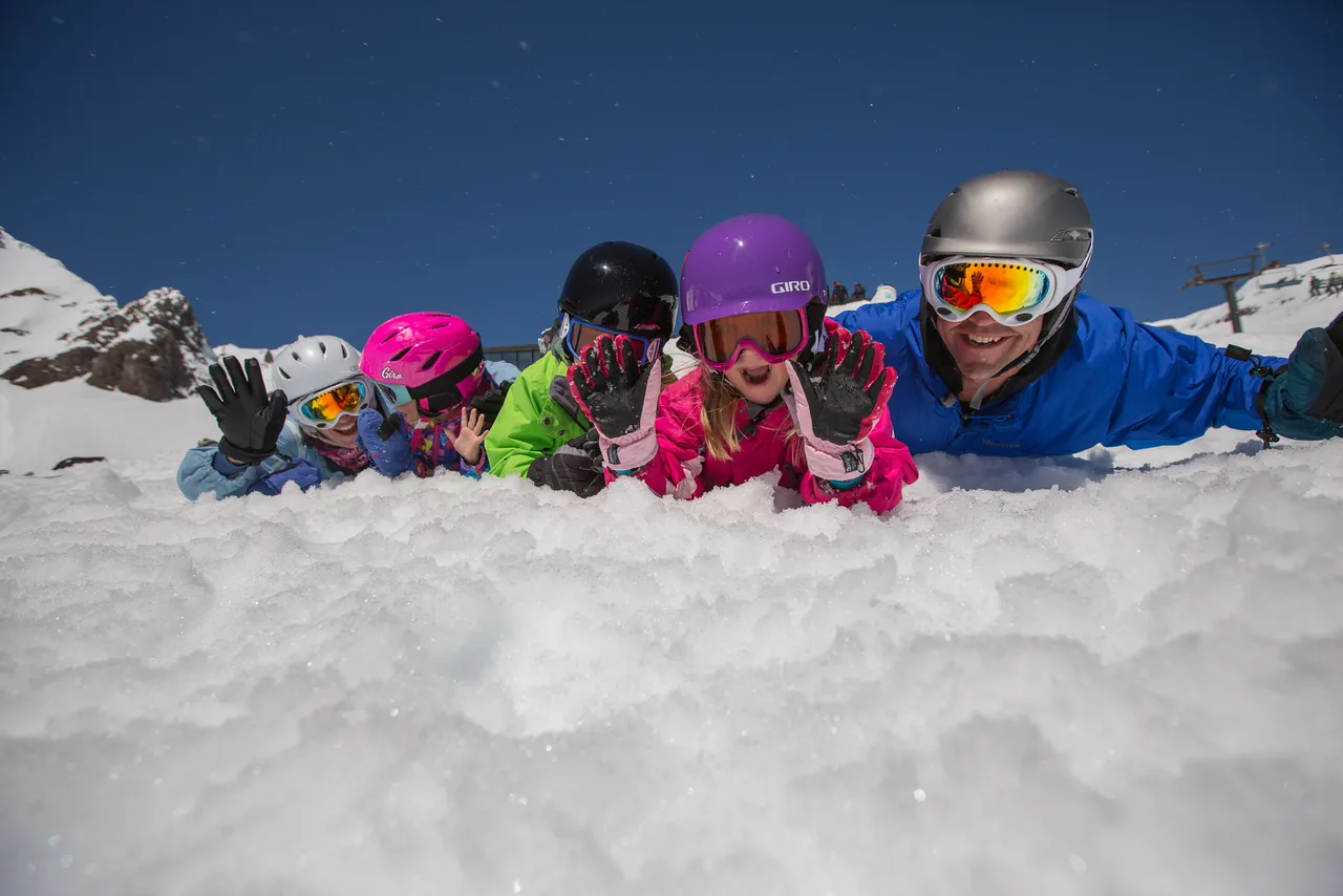 Family Play in the snow Whakapapa
