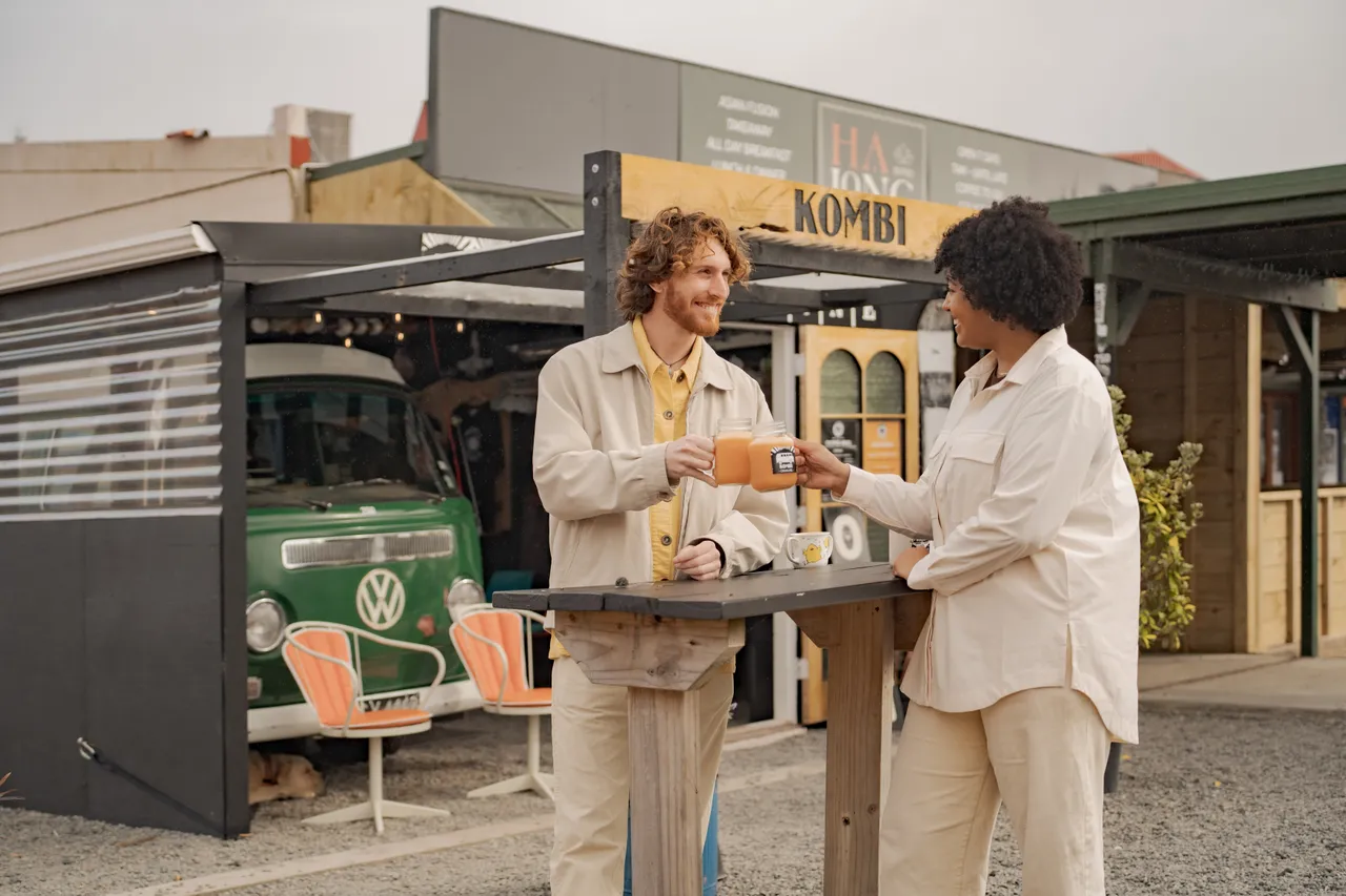Couple Enjoying a Carrot Juice at Kombi Ohakune