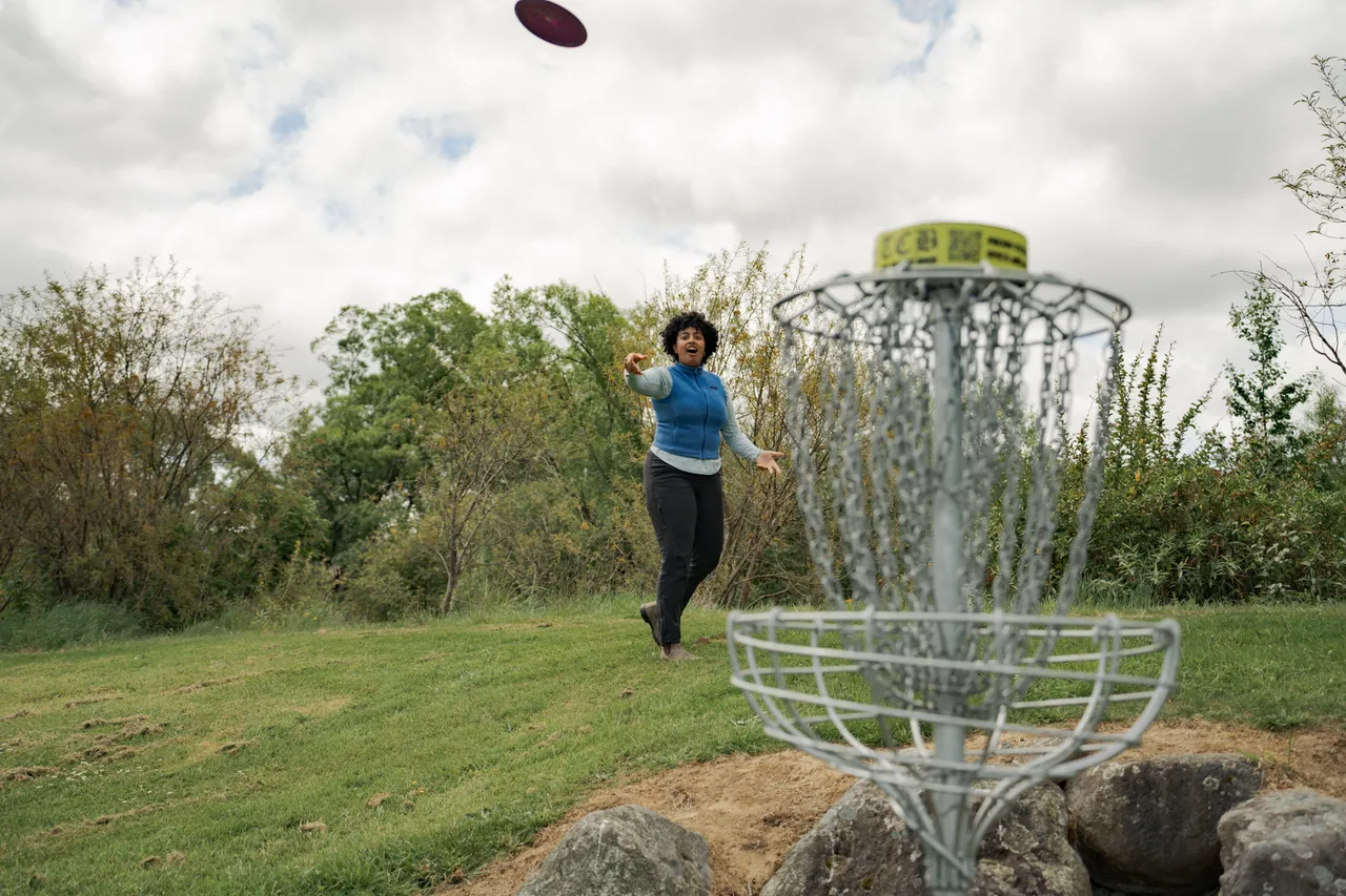 Lady Playing Disc Golf in Ohakune