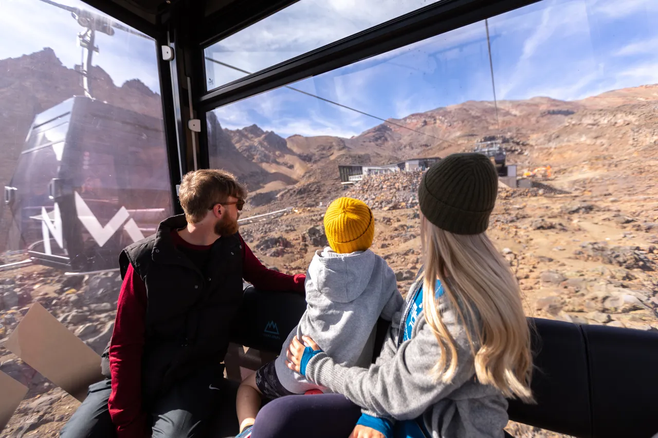 Family heading up on the Sky Waka gondola