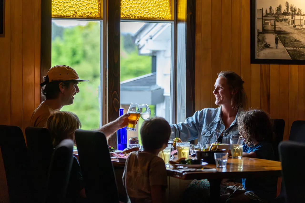 Family Enjoying a Meal at Kings Ohakune