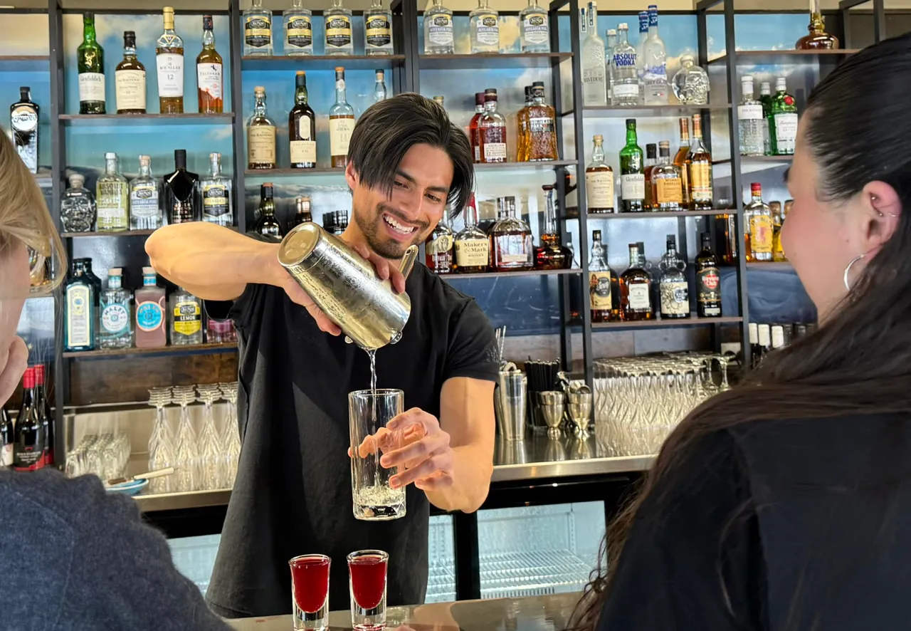 Getting a drink from Freddies Cafe at Tūroa Ski Area