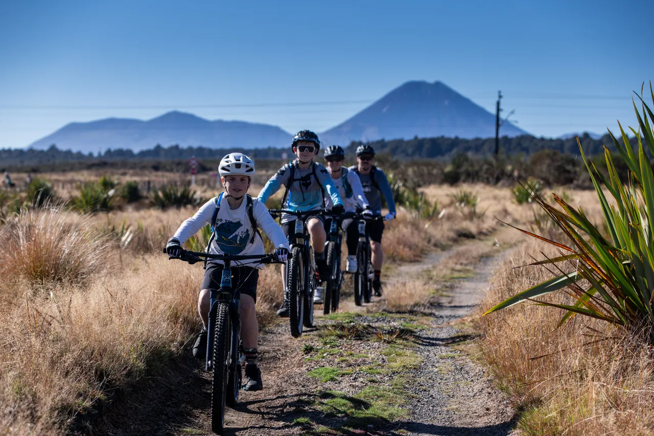 A family Mountain Biking the Marton Sash and Door Tramway in Waimarino