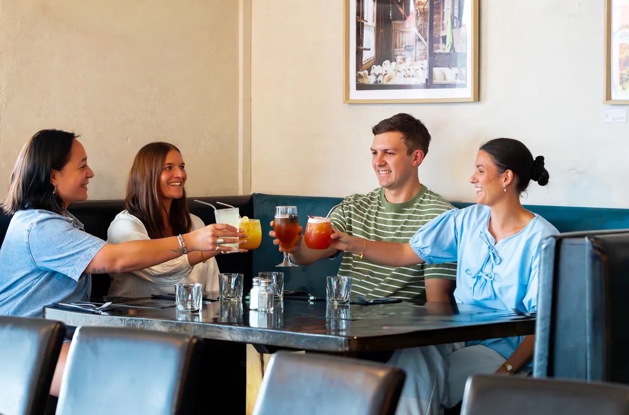 Friends Enjoying a Meal Together at No.8 Restaurant