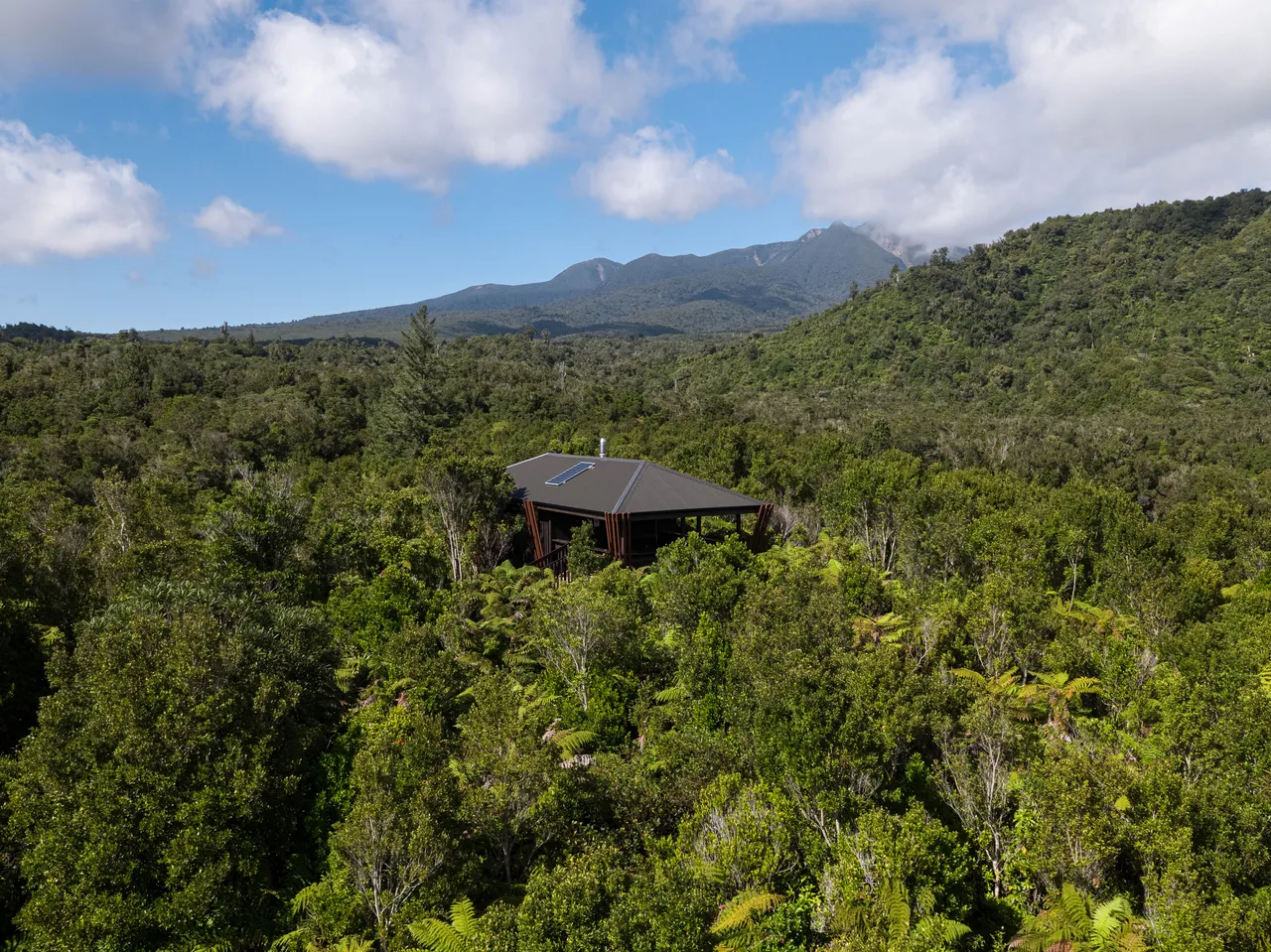 Taranaki Content Library - Pīwakawaka Hut Pukeiti Gardens