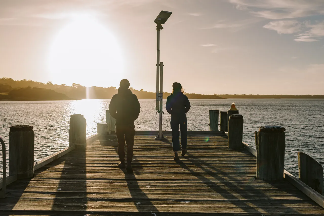 People Walking on Pier