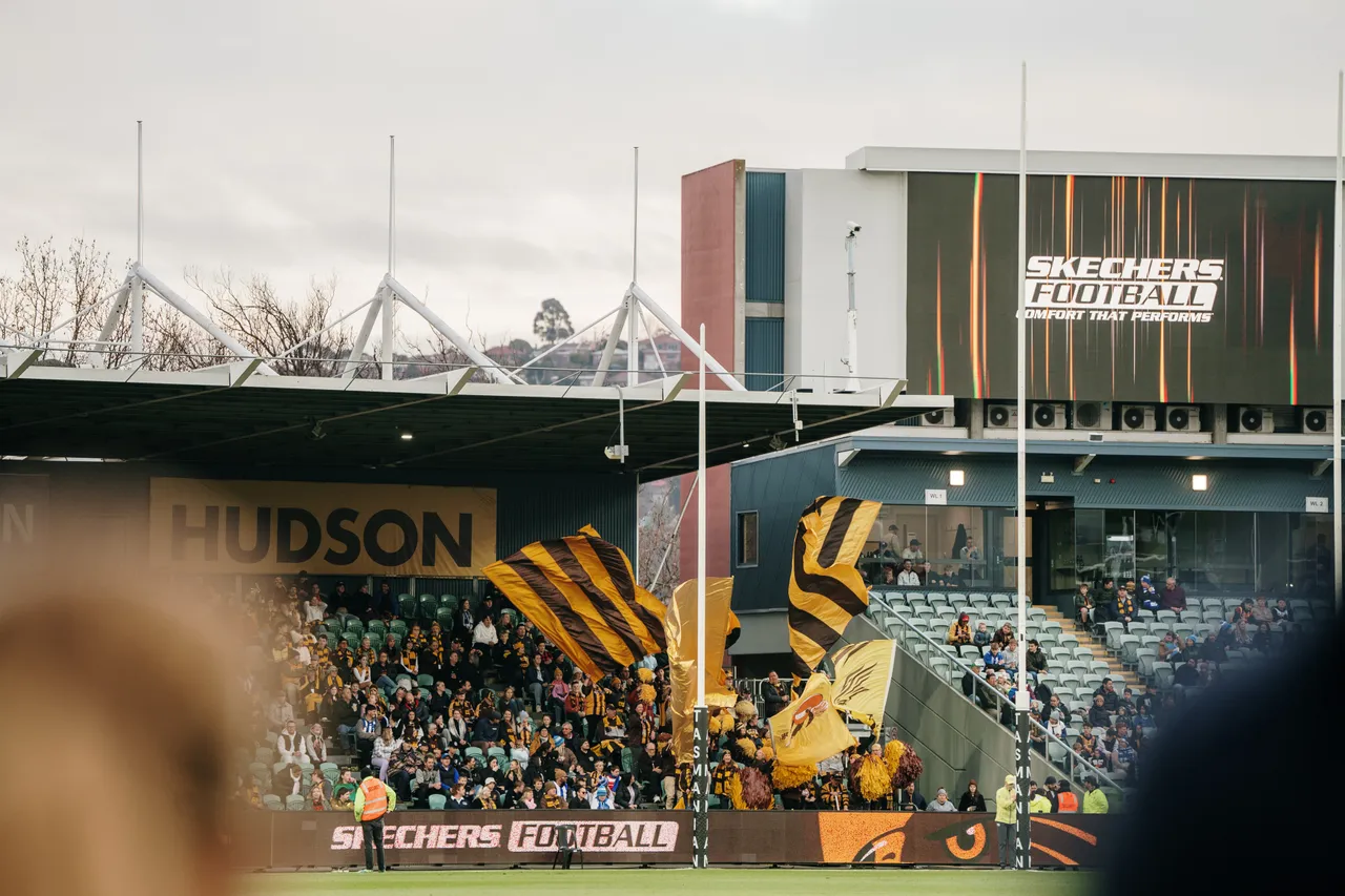 Waving Hawks Flags at UTAS Stadium