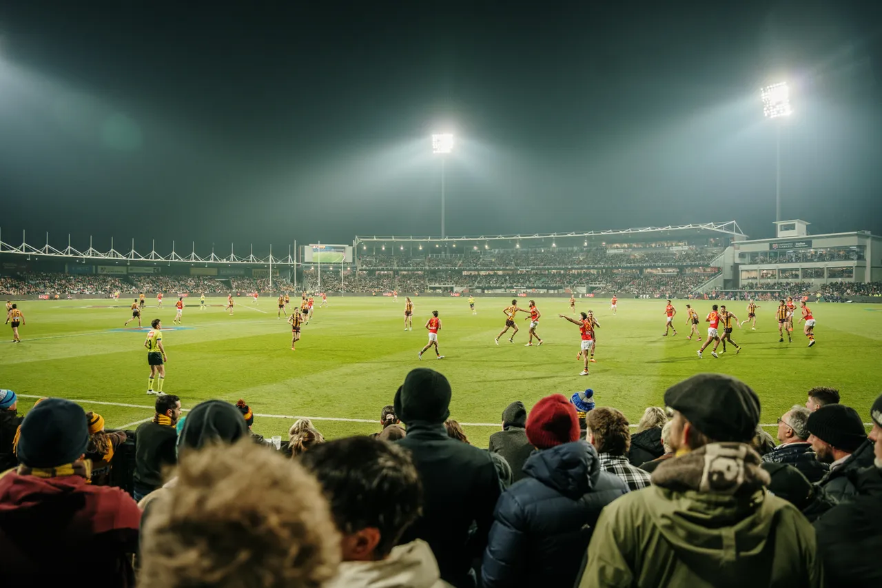 Spectators Watching Football at UTAS Stadium
