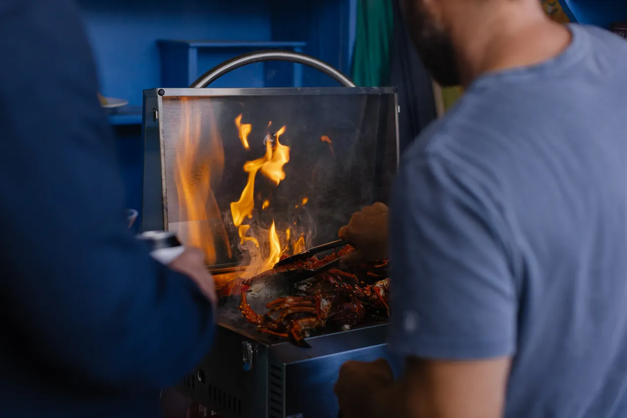 Person Cooking Crayfish