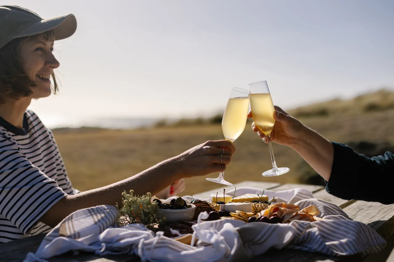 Sparkling Cheers Over Cheese Board