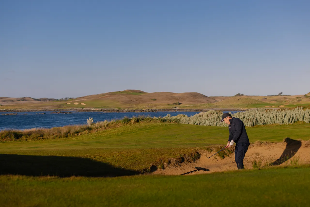 Golfer Chipping from Bunker