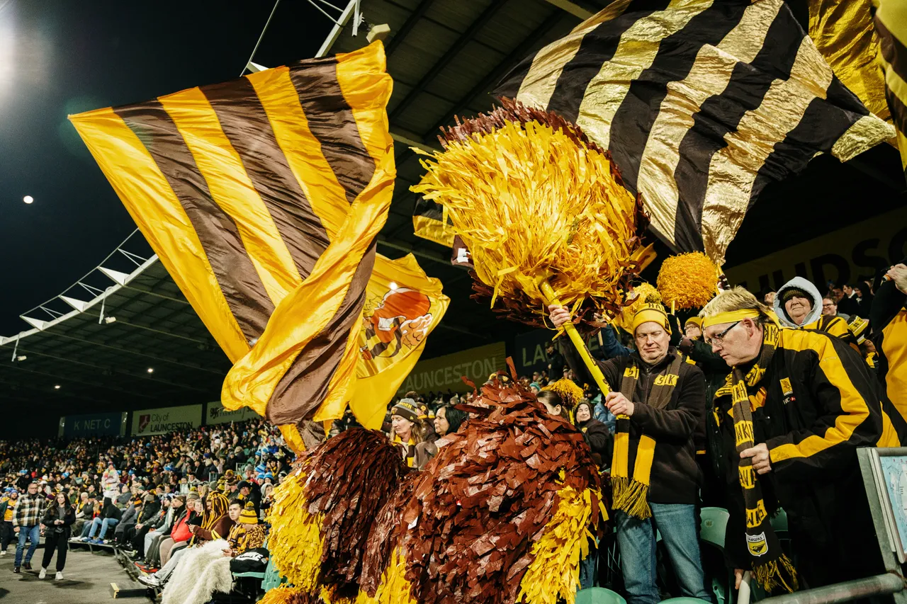 Waving Hawks Flags at UTAS Stadium