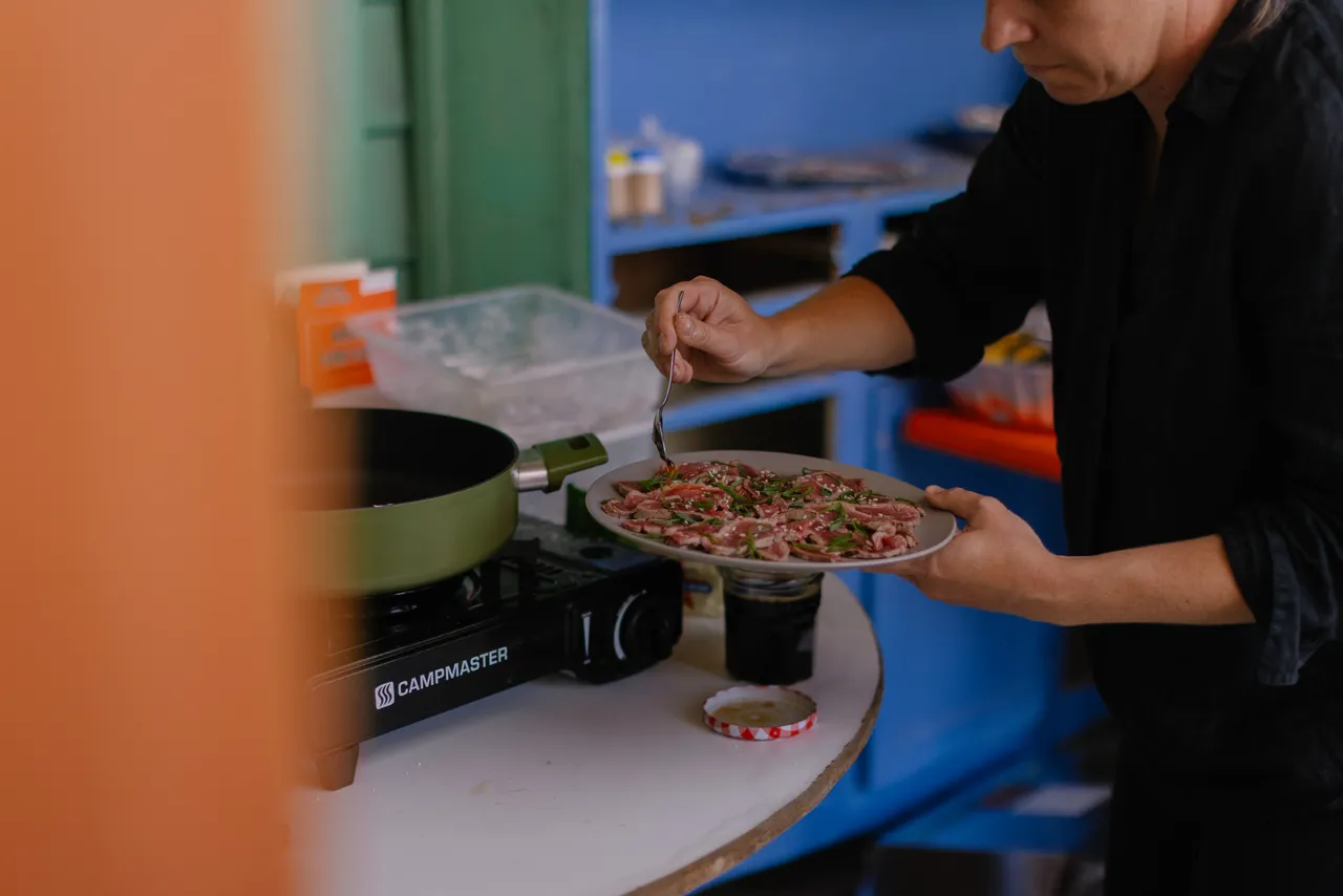 Person Serving Beef Tataki