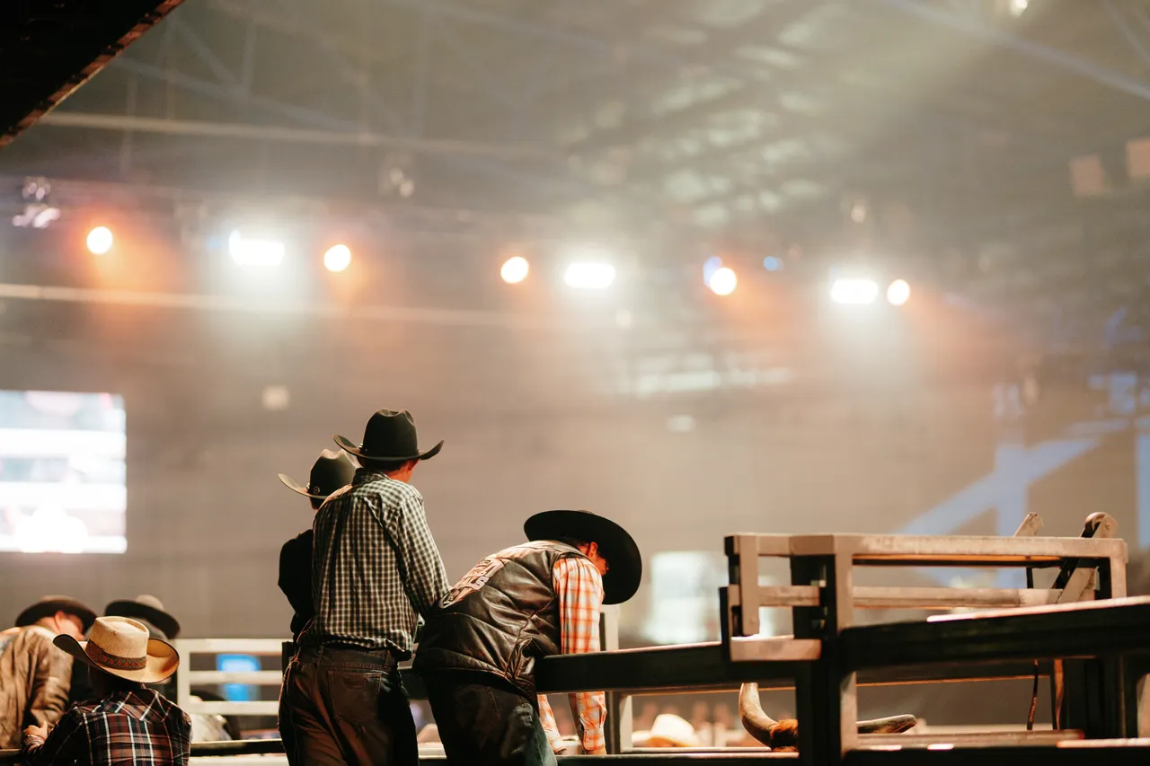 Bull Riders at the Island Stampede Rodeo