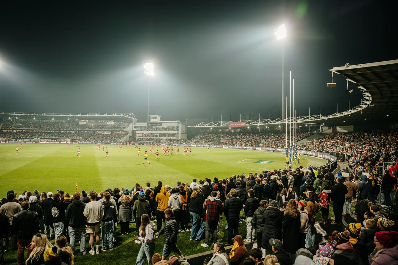 Spectators Watching Football at UTAS Stadium
