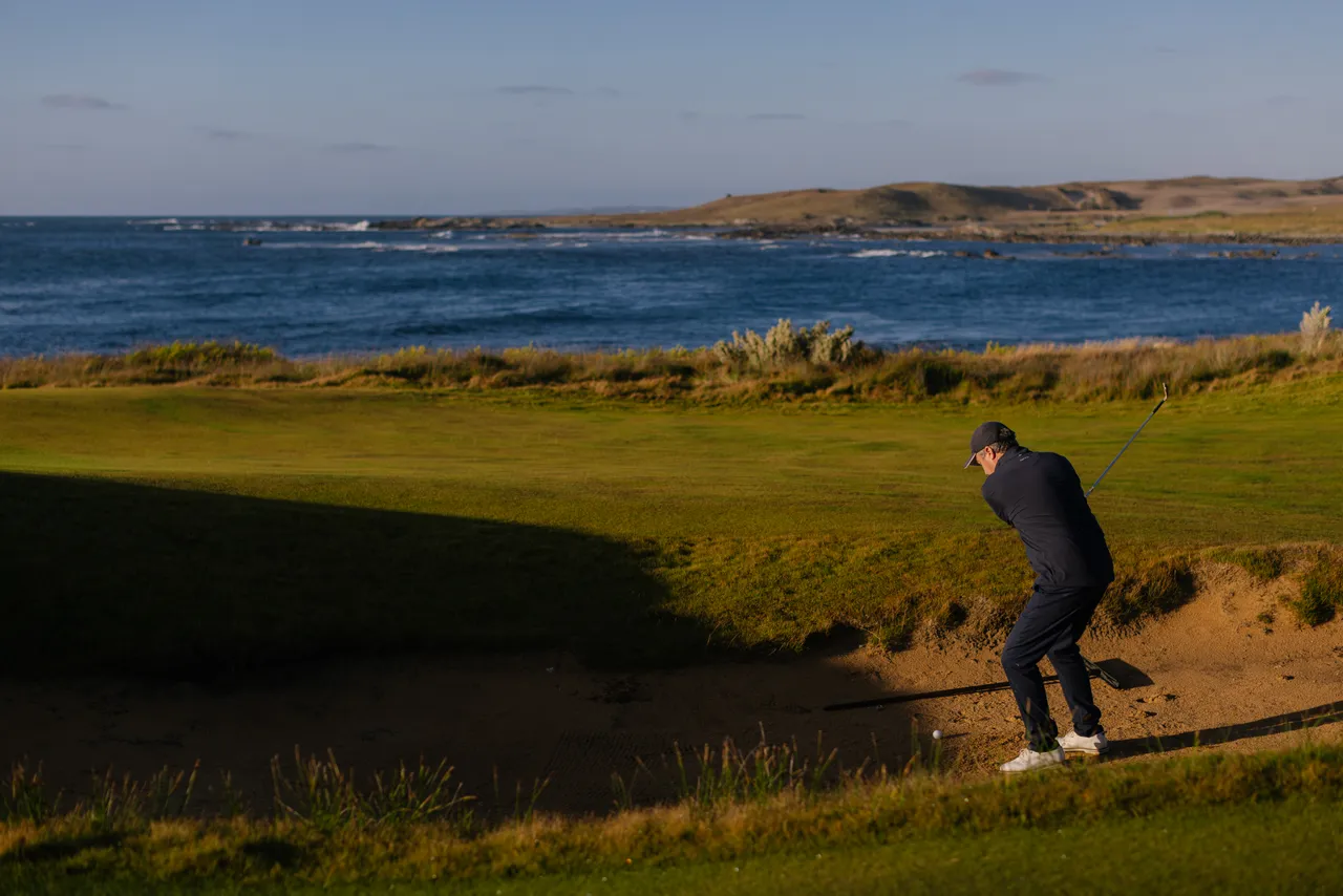 Golfer Chipping from Bunker