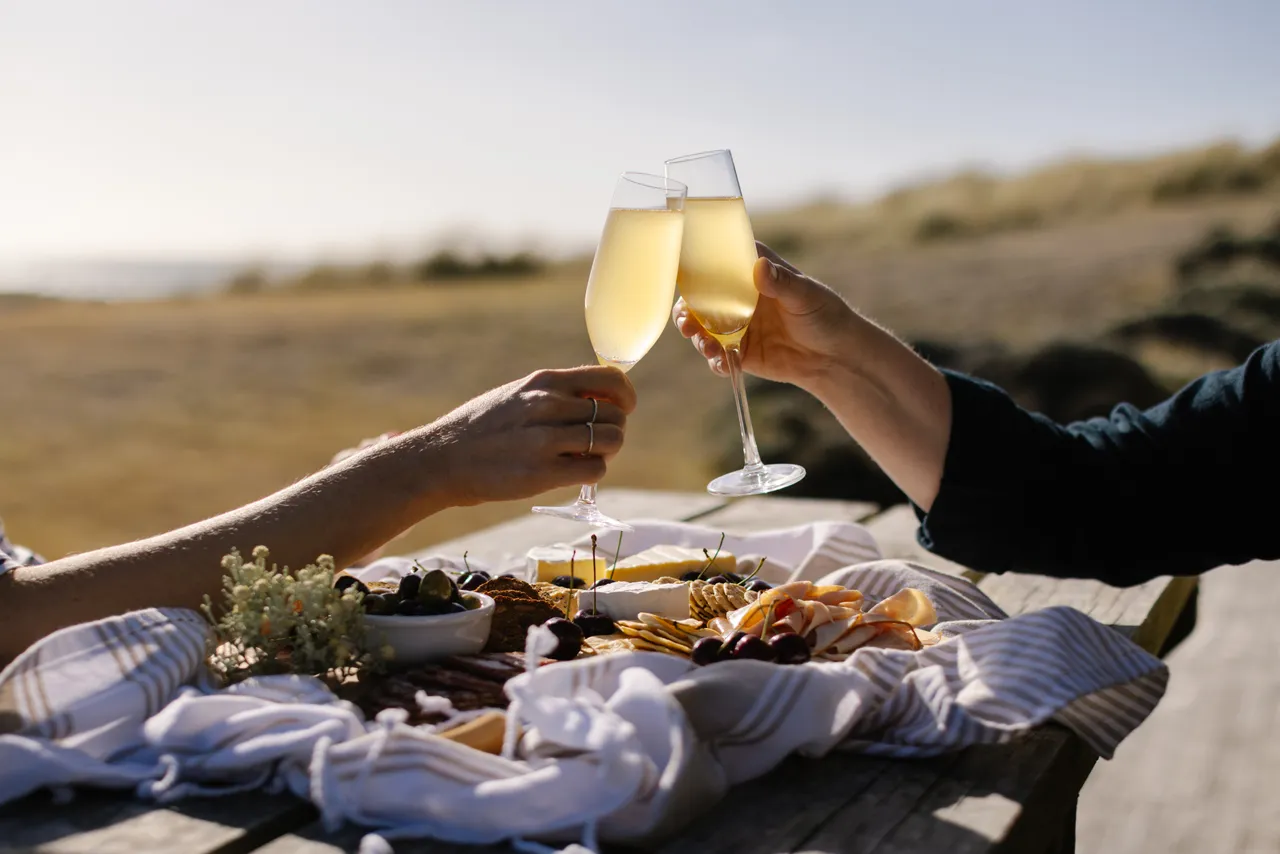 Sparkling Cheers Over Cheese Board