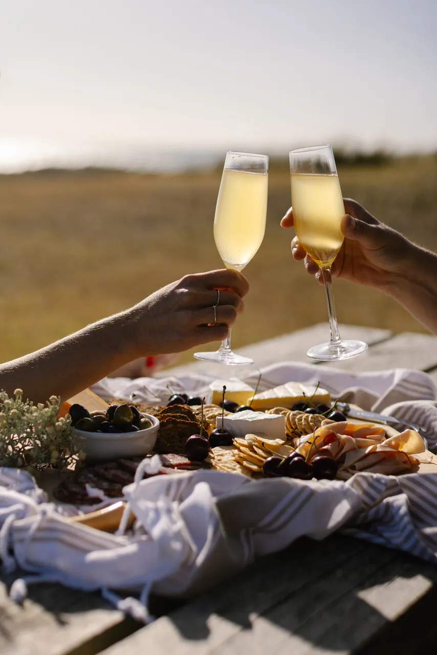 Sparkling Cheers Over Cheese Board