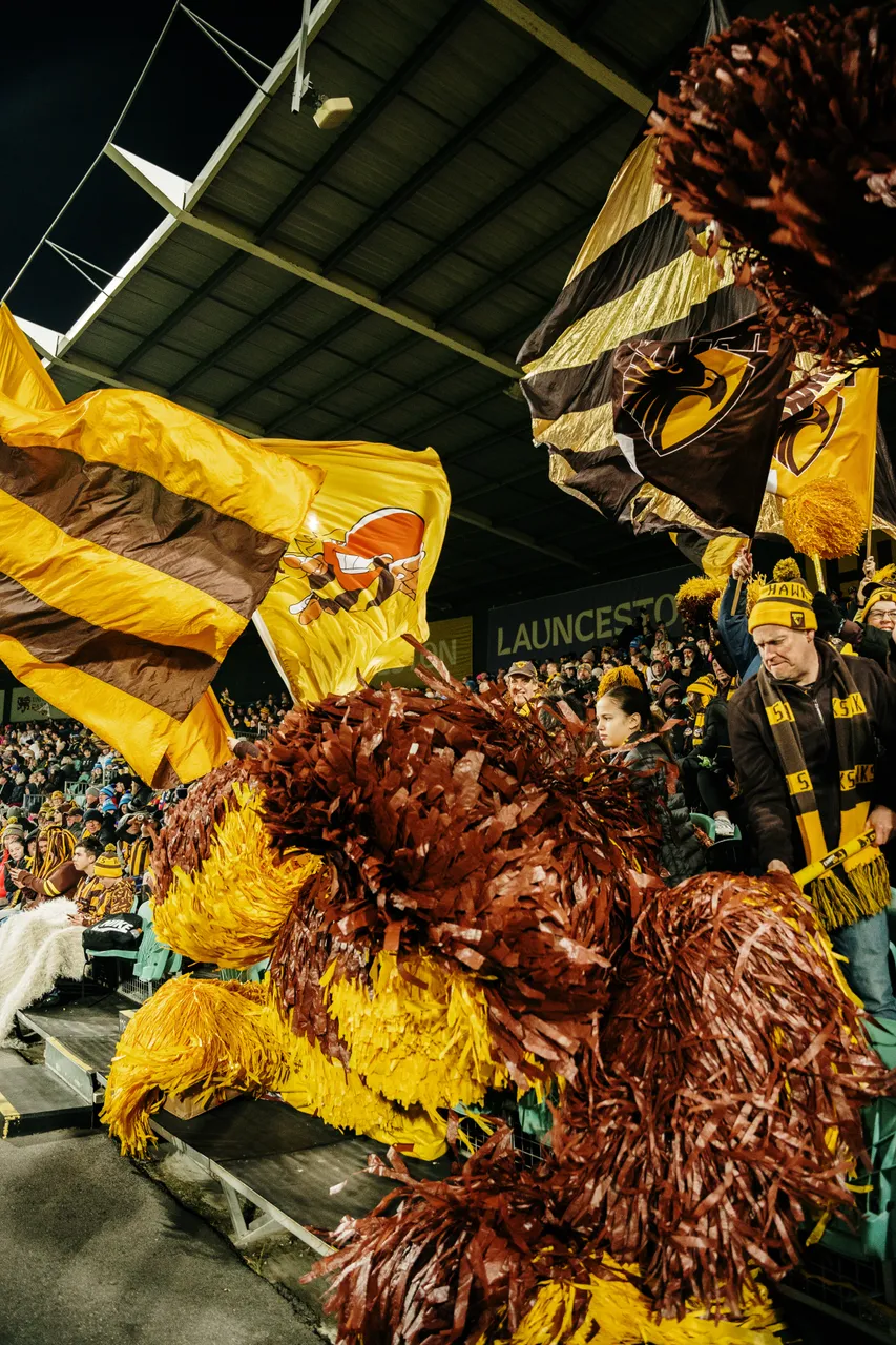 Waving Hawks Flags at UTAS Stadium