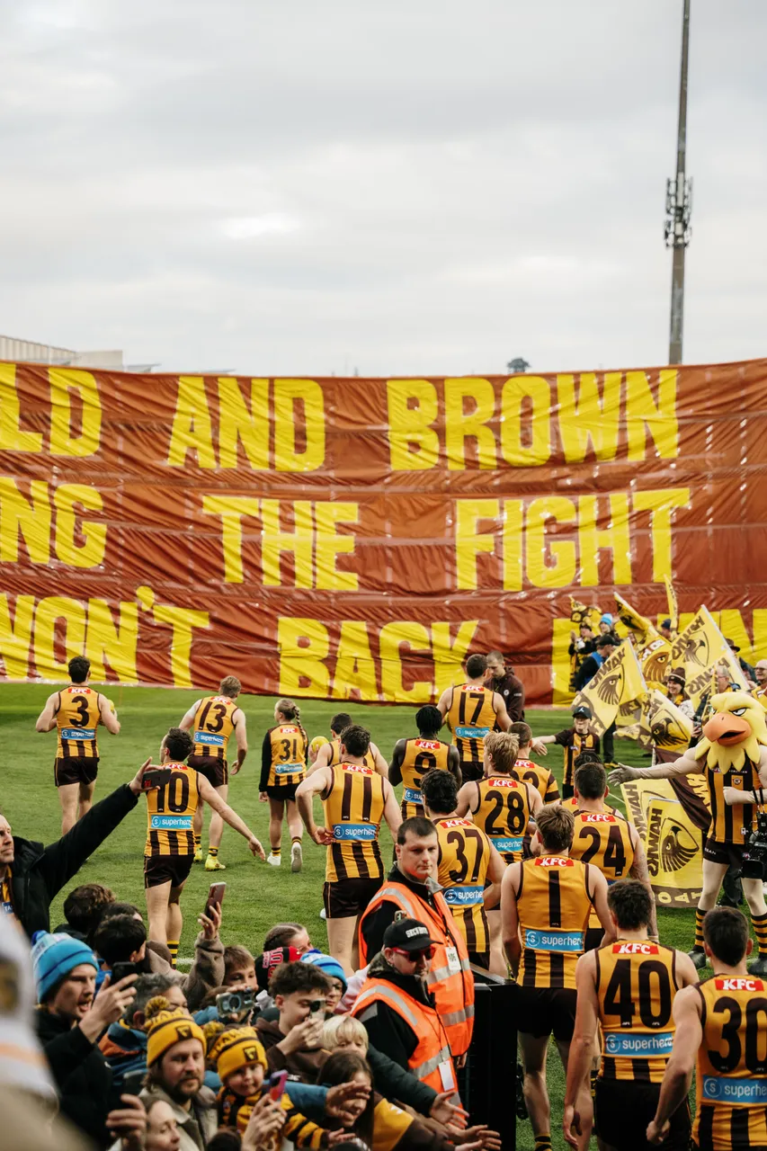 Running Through Banner at UTAS Stadium