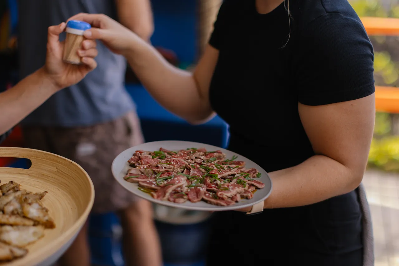 Person Serving Beef Tataki